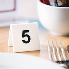 TABLE NUMBERS AND RESERVE SIGNS